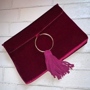 Magenta Tassel Clutch